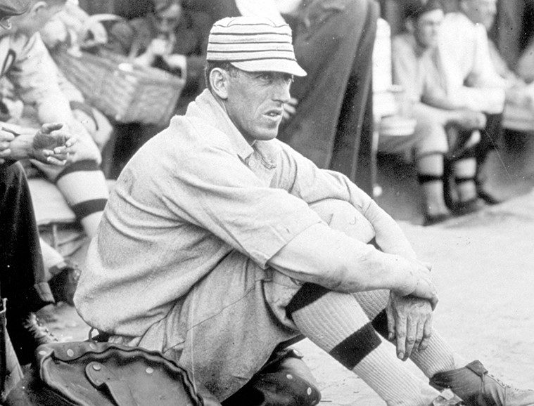 1930_Man sitting on floor watching Detroit Tigers game
